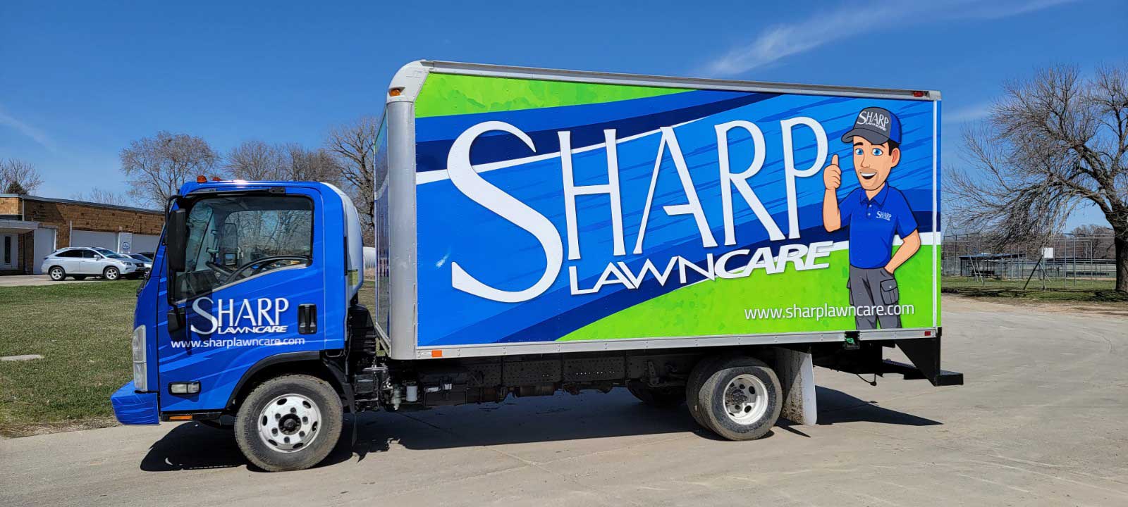 Sharp Lawn Care service truck in Sioux Falls, SD.