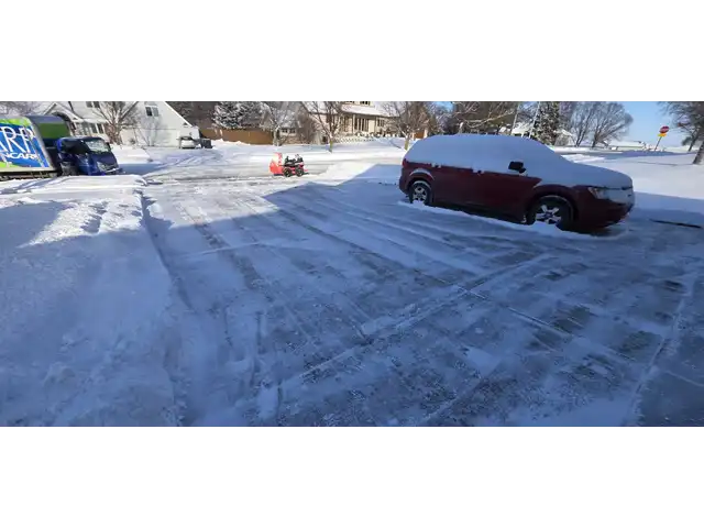 A plowed driveway after a winter storm in Sioux Falls, SD.