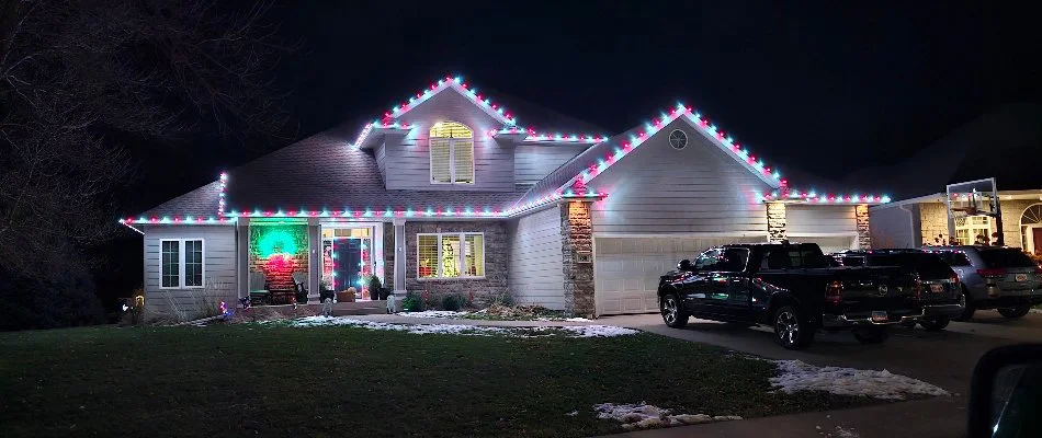 Beautifully decorated house with colorful Christmas lights.