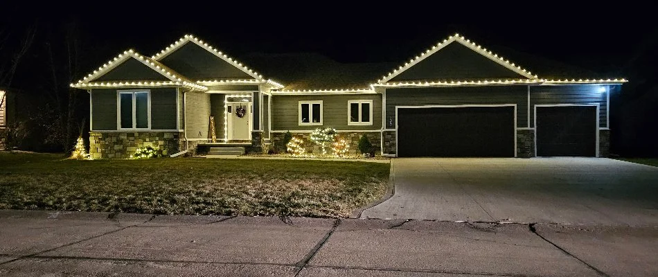 Elegant and modern home with warm white Christmas lights.