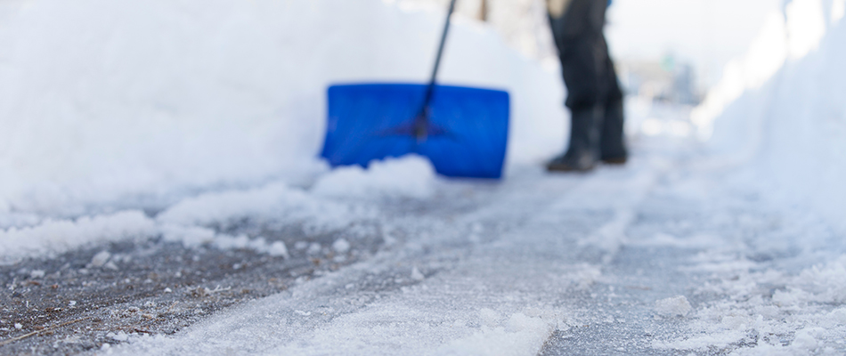 Professional shoveling snow in Lawton, IA.