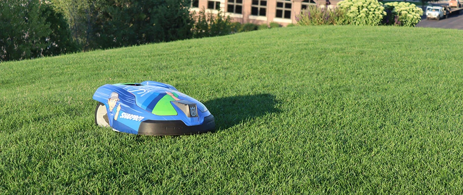 Robotic mower in lawn in North Sioux City, SD.