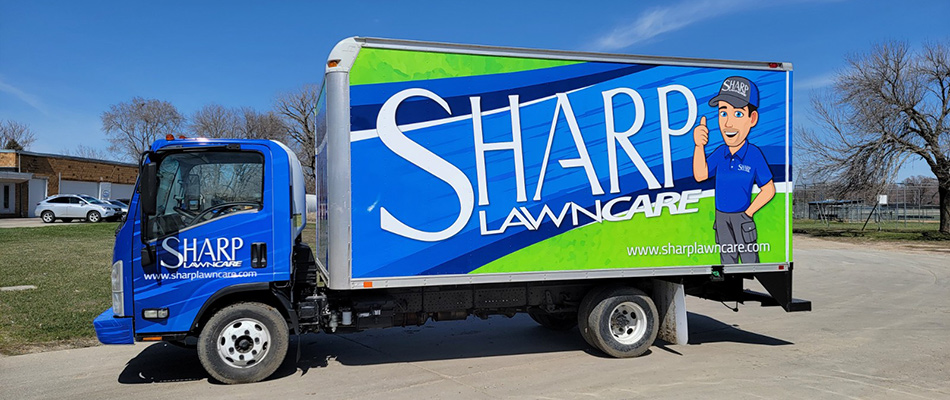 Sharp Lawn Care Company truck displayed in Hawarden, IA.
