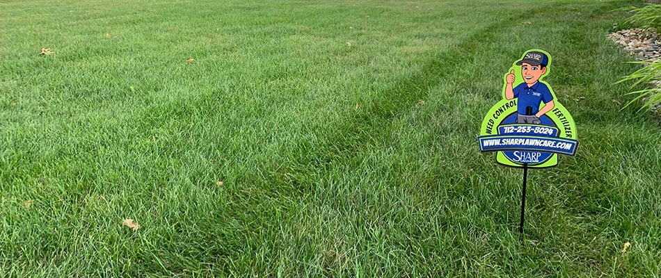 Sharp Care signage in freshly mowed lawn in Hawarden, IA.